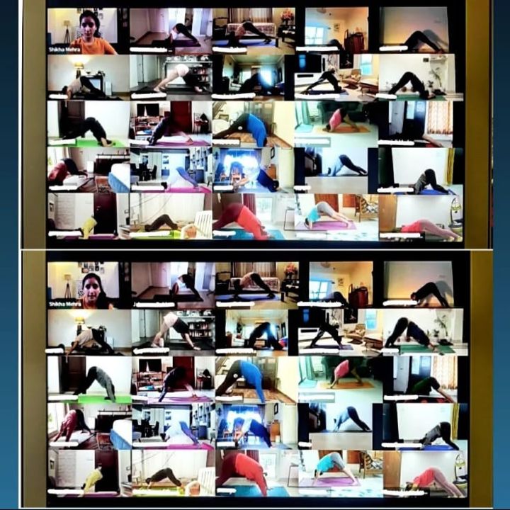 A live online yoga class with Shikha, students on a video call