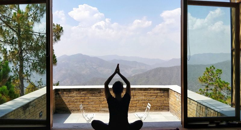 Meditation at a window over the hills